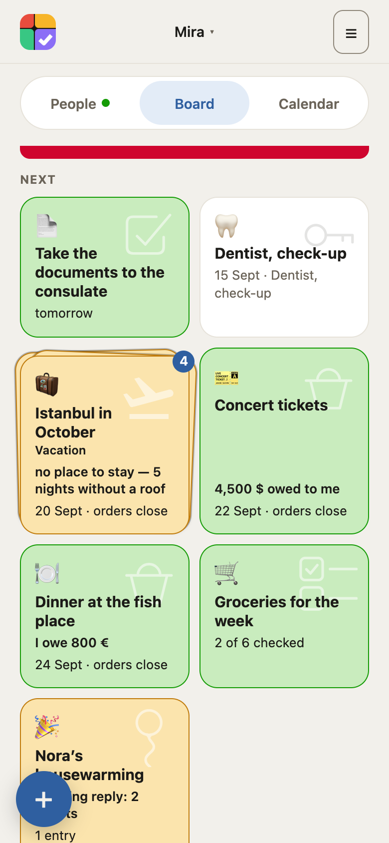The board: ordinary tiles and a stack — a trip with its bookings and tasks